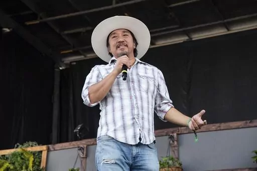 Edward Lee speaks at Bourbon and Beyond Music Festival at Kentucky Exposition Center on Sunday, Sept. 18, 2022, in Louisville, Ky. Chef Edward Lee says food, at its best, tells a story. And the story he wants to be told with the meal he's whipping up for next week's White House state dinner is of the deep connection between the United States and South Korea, its ally. (Photo by Amy Harris/Invision/AP, File)