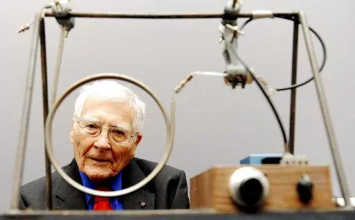 Scientist and inventor James Lovelock, 94, poses with one of his early inventions, a homemade Gas Chromatography device, used for measuring gas and molecules present in the atmosphere, during a photocall for the Unlocking Lovelock: Scientist, Inventor, Maverick exhibition at the Science Museum, south west London. The British environmental scientist whose influential Gaia theory sees the Earth as a living organism gravely imperiled by human activity has died on his 103rd birthday, it was announce