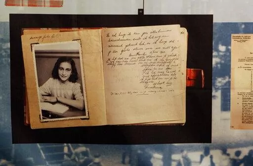 A photo of Anne Frank is displayed at the opening of the exhibition: "Anne Frank, a History for Today", at the Westerbork Remembrance Centre in Hooghalen, northeast Netherlands, Firday, June 12, 2009. On Saturday, Oct. 15, 20222, Rebecka Fallenkvist, a Sweden Democrats official, was suspended by the far-right party for making degrading comments about Jewish teenage diarist Anne Frank. (AP Photo/Bas Czerwinski, File)