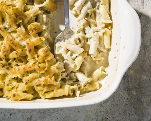 This image released by Milk Street shows a recipe for creamy four cheese pasta. (Milk Street via AP)