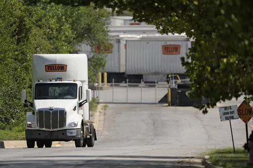 Yellow Corp. trucks are seen at a YRC Freight terminal Friday, July 28, 2023, in Kansas City, Mo. After years of financial struggles, Yellow is reportedly preparing for bankruptcy and seeing customers leave in large numbers — heightening risk for future liquidation. While no official decision has been announced by the company, the prospect of bankruptcy has renewed attention around Yellow's ongoing negotiations with unionized workers, a $700 million pandemic-era loan from the government and ot