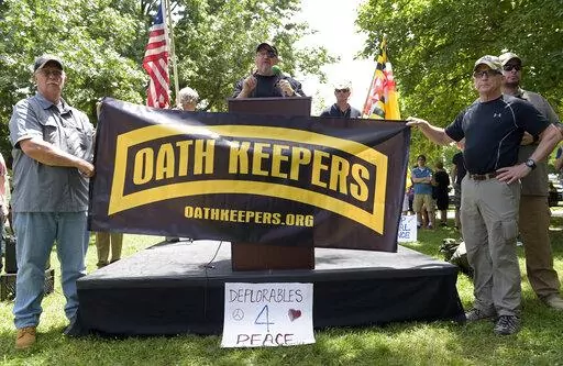 Stewart Rhodes, founder of the citizen militia group known as the Oath Keepers, center, speaks during a rally outside the White House in Washington, on June 25, 2017. The seditious conspiracy case filed this week against members and associates of the far-right Oath Keepers militia group marked the boldest attempt so far by the government to prosecute those who attacked the U.S. Capitol during the Jan. 6 riot. (AP Photo/Susan Walsh, File)
