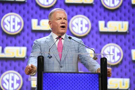 LSU head coach Brian Kelly speaks during Southeastern Conference NCAA college football media days Monday, July 15, 2024, in Dallas. (AP Photo/Jeffrey McWhorter)