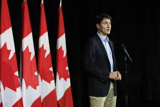 Canadian Prime Minister Justin Trudeau speaks with reporters during a news conference at the Federal ministers cabinet retreat in Halifax, Nova Scotia, Monday, Aug. 26, 2024. (Kelly Clark/The Canadian Press via AP)