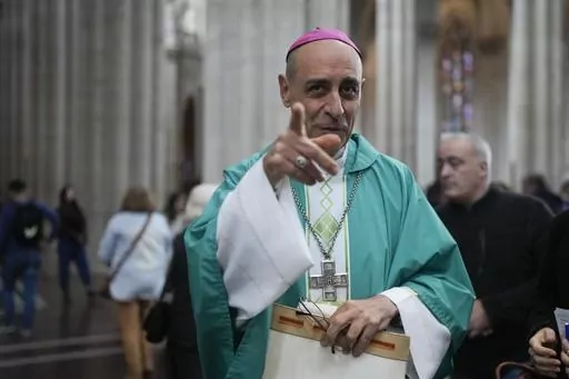 Victor Manuel Fernandez, then archbishop of La Plata, smiles after a Mass at the Cathedral in La Plata, Argentina, Sunday, July 9, 2023. The Vatican’s new doctrine chief, already under fire from entire bishops conferences for his approval of blessings for same-sex couples, is raising eyebrows anew over a book he wrote as a young priest describing orgasms in graphic terms. (AP Photo/Natacha Pisarenko, File)