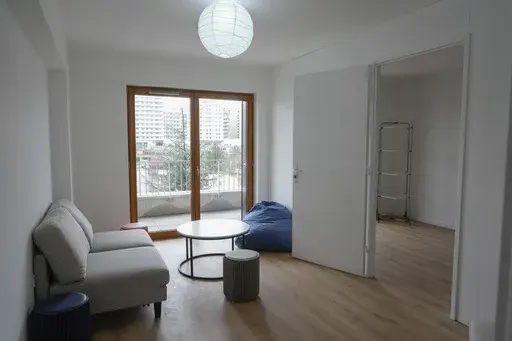 A living room of the Olympic village is pictured, in Saint-Denis, north of Paris Wednesday, Feb. 28, 2024. The U.S. Olympic team is one of a handful that will supply air conditioners for their athletes at the Paris Games in a move that undercuts organizers' plans to cut carbon emissions. (AP Photo/Thibault Camus, File)