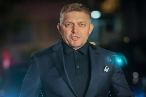 Former Prime Minister Robert Fico arrives to his party's headquarters after polling stations closed for an early parliamentary election, in Bratislava, Slovakia, Saturday, Sept. 30, 2023. (AP Photo/Darko Bandic)