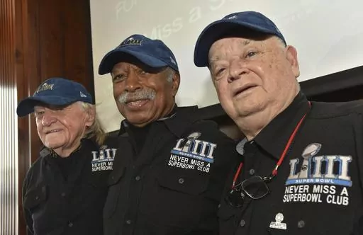 Members of the Never Miss a Super Bowl Club, from the left, Tom Henschel, Gregory Eaton, and Don Crisman pose for a group photograph during a welcome luncheon, in Atlanta, Friday, Feb. 1, 2019. As long as they still have each other, they're still going to go to every Super Bowl. That's the sentiment shared by the three friends who say they are the final fans who can claim membership in the exclusive “never missed a Super Bowl” club. And they're back again for number 58 — Super Bowl 58 — 