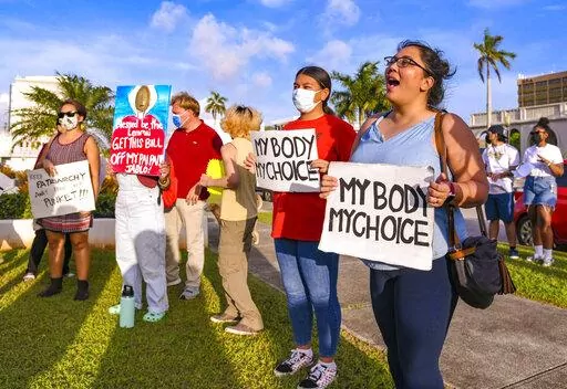 "My body, my choice!" resonates from protesters on the front lawn of the Guam Congress Building in Hagåtña during a protest as they voiced their concerns against the Guam Heartbeat Act of 2022 on April 27, 2022. Women from the remote U.S. territories of Guam and the Northern Mariana Islands will likely have to travel farther than other Americans to terminate a pregnancy if the Supreme Court overturns a precedent that established a national right to abortion in the United States. (Rick Cruz/The