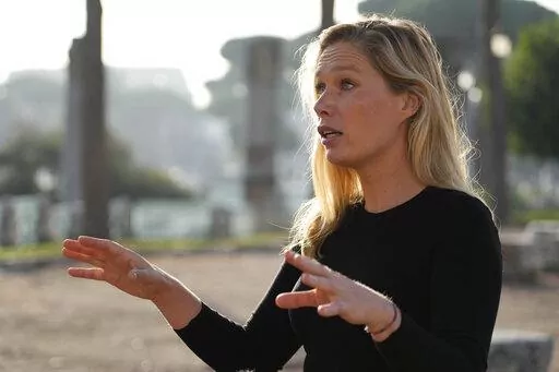 Laura Hart, campaign director of Safeguard Defenders is interviewed by the Associated Press in Rome, Thursday, Oct. 27, 2022. China has reportedly established dozens of “overseas police stations” in nations around the world that activists fear could be used to track and harass dissidents as part of Beijing’s crackdown on corruption. Spanish-based non-government group Safeguard Defenders published a report last month called “110 Overseas. Chinese Transnational Policing Gone Wild” that f