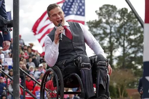 Rep. Madison Cawthorn, R-N.C., speaks before former President Donald Trump takes the stage at a rally on April 9, 2022, in Selma, N.C. A series of unforced political and personal errors by Cawthorn has brought the forces of big-name Republicans and traditional enemies to bear on his reelection bid in North Carolina.(AP Photo/Chris Seward, File)
