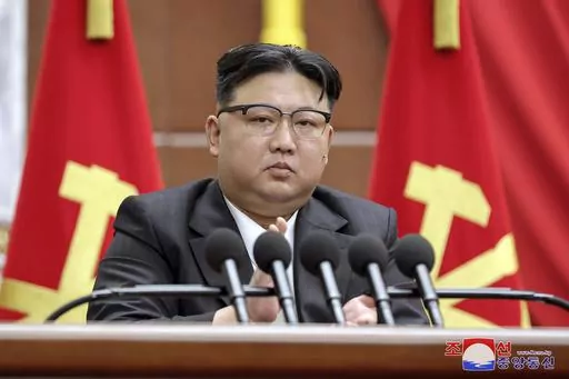 In this photo provided by the North Korean government, North Korean leader Kim Jong Un delivers a speech during a year-end plenary meeting of the ruling Workers’ Party, which was held between Dec. 26, and Dec. 30, 2023, in Pyongyang, North Korea. Independent journalists were not given access to cover the event depicted in this image distributed by the North Korean government. The content of this image is as provided and cannot be independently verified. Korean language watermark on image as pr