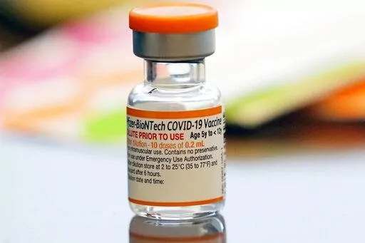 A vial of the Pfizer-BioNTech COVID-19 vaccine for children 5 to 12 years old sits ready for use at a vaccination site in Fort Worth, Texas, Thursday, Nov. 11, 2021. Kids ages 5 to 11 should get a booster dose of Pfizer’s COVID-19 vaccine, advisers to the U.S. government said Thursday, May 19, 2022. (AP Photo/LM Otero, File)