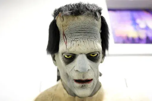 A Frankenstein mask is seen on display at The Theatrical Shop, Tuesday, Oct. 29, 2024, in West Des Moines, Iowa. (AP Photo/Charlie Neibergall)