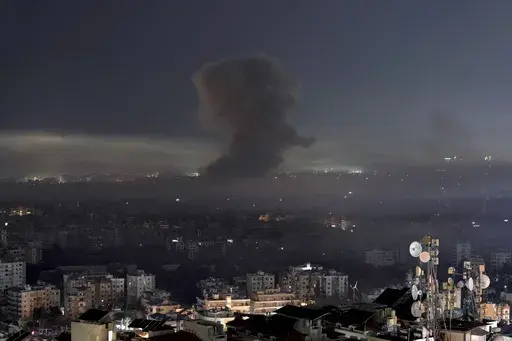 Smoke rises after an Israeli airstrike on Dahiyeh, in the southern suburb of Beirut, early Saturday, Nov. 9, 2024. (AP Photo/Bilal Hussein)