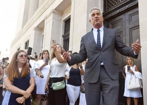 Attorney Robert F. Kennedy, Jr. speaks after a hearing challenging the constitutionality of the state legislature's repeal of the religious exemption to vaccination on behalf of New York state families who held lawful religious exemptions, during a rally outside the Albany County Courthouse Aug. 14, 2019, in Albany, N.Y. Instagram and Facebook have suspended Children's Health Defense from its platforms for repeated violations of its policies on COVID-19 misinformation. The nonprofit led by Rober