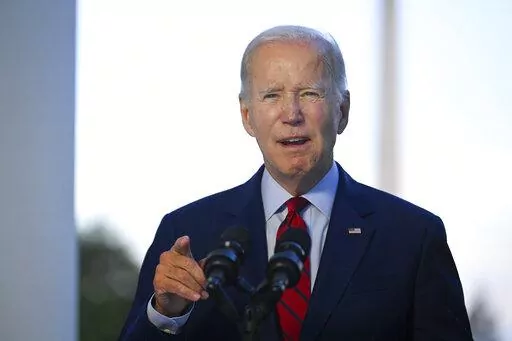 President Joe Biden speaks from the Blue Room Balcony of the White House Monday, Aug. 1, 2022, in Washington, as he announces that a U.S. airstrike killed al-Qaida leader Ayman al-Zawahri in Afghanistan. (Jim Watson/Pool via AP)