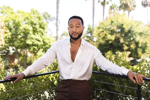 John Legend poses for a portrait on Monday, Aug. 15, 2022, in West Hollywood, Calif., to promote his latest double album "Legend." (Photo by Willy Sanjuan/Invision/AP)