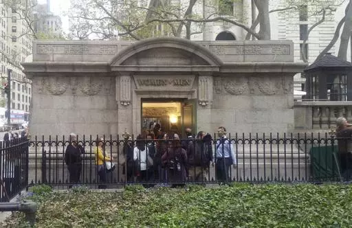 People line up to use a free public restroom, April 27, 2017, in New York. New York City Mayor Eric Adams announced Monday, June 3, 2024, a plan to build 46 new restrooms and renovate 36 existing ones located in city parks, adding to the city's roughly 1,000 such facilities over the next five years. (AP Photo/Verena Dobnik, File)