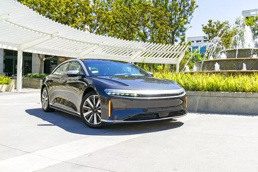 This photo provided by Edmunds shows the 2022 Lucid Air, a luxury electric sedan with an EPA-estimated range of up to 520 miles. (Rex Tokeshi-Torres/Edmunds.com via AP)
