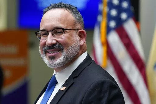 Secretary of Education Miguel Cardona speaks during a visit with first lady Jill Biden to Bergen Community College in Paramus, N.J., Jan. 20, 2022. The Biden administration plans to freeze federal student loan payments through Aug. 31, extending a moratorium that has allowed millions of Americans to postpone payments during the coronavirus pandemic. The decision was confirmed by an administration official familiar with the White House’s decision-making. (AP Photo/Seth Wenig, File)