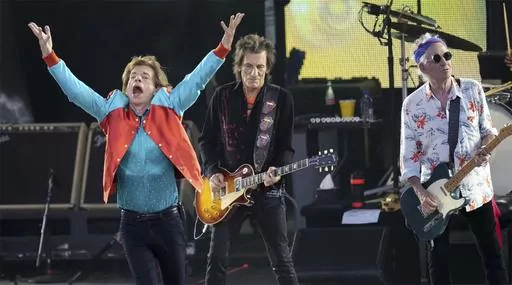 Mick Jagger, left, Ronnie Wood, center, and Keith Richards, right, of the band "The Rolling Stones," perform onstage during the last concert of their "Sixty" European tour in Berlin, Germany, Aug. 3, 2022. On Monday, Sept. 4, 2023, the Rolling Stones announced they will release their first album of original material in 18 years. Titled “Hackney Diamonds,” the legendary rock band will reveal the full details on Wednesday, Sept. 6, at an event in Hackney in East London. (AP Photo/Michael Sohn,