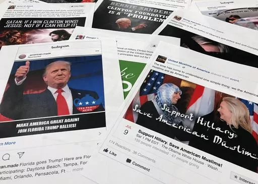 Printouts of some of the Facebook and Instagram ads linked to a Russian effort to disrupt the American political process and stir up tensions around divisive social issues, released by members of the U.S. House Intelligence committee, photographed in Washington, are photographed on Nov. 1, 2017. Federal prosecutors and lawyers for Donald Trump have signaled their desire to invoke the 2016 election in the former president's trial on charges of scheming to overturn the results of the 2020 presiden