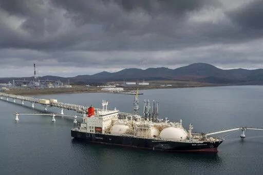 The tanker Sun Arrows loads its cargo of liquefied natural gas from the Sakhalin-2 project in the port of Prigorodnoye, Russia, on Oct. 29, 2021. For the U.S. at least, removing Russia's most favored nation status is a mostly symbolic gesture. The U.S. ban that was announced last month on imports of Russian oil, gas and coal already eliminated about 60% of all U.S. imports from Russia.  (AP Photo/File)