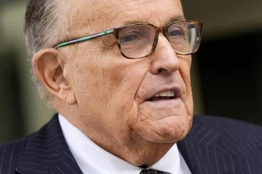 Rudy Giuliani speaks with reporters as he departs the federal courthouse, May 19, 2023, in Washington. Giuliani, who as a member of Donald Trump's legal team sought to overturn 2020 presidential election results in battleground states, was interviewed recently by investigators with the Justice Department special counsel's office, according to a person familiar with the matter. (AP Photo/Patrick Semansky, File)