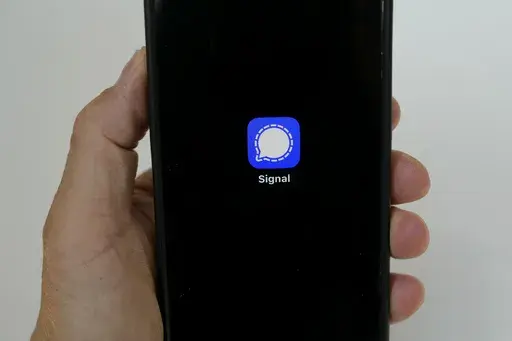 An image of the Signal app is shown on a mobile phone in San Francisco, March 18, 2025. (AP Photo/Jeff Chiu, file)