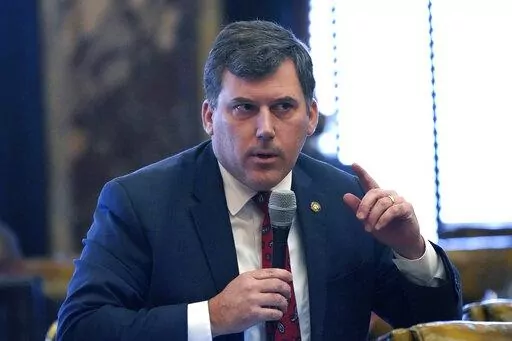 Republican Sen. Daniel Sparks, of Belmont, asks a question during floor debate over a bill that would cut hundreds of millions of dollars in state revenue by phasing out part of the income tax and reducing the sales tax on groceries in Senate chamber at the Mississippi Capitol in Jackson, Miss., Wednesday, Feb. 23, 2022. The bill passed the Senate. (AP Photo/Rogelio V. Solis)