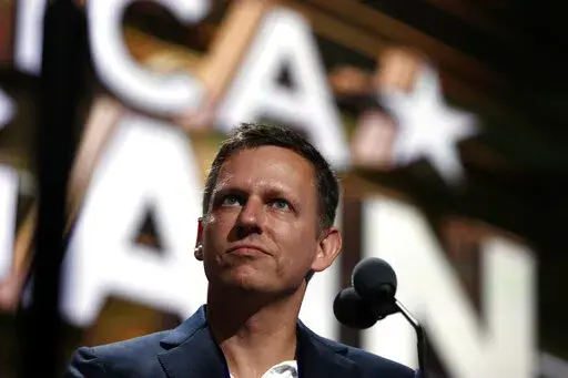 Billionaire tech investor Peter Thiel looks over the podium before the start of the second day session of the Republican National Convention in Cleveland, Tuesday, July 19, 2016. Thiel, a Silicon Valley billionaire and advisor to former President Donald Trump, is leaving the board of directors of Facebook parent company Meta, the company announced Monday, Feb. 7, 2022. (AP Photo/Carolyn Kaster, File)