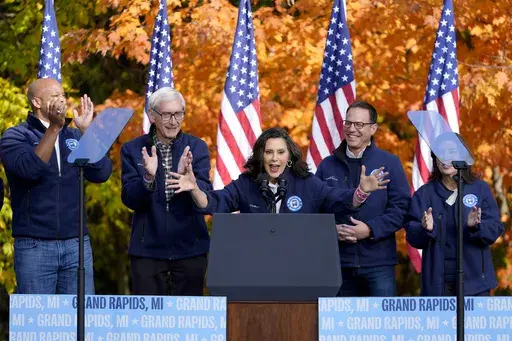 Michigan Gov. Gretchen Whitmer speaks, accompanied by Maryland Gov. Wes Moore, from left, Wisconsin Gov. Tony Evers, Pennsylvania Gov. Josh Shapiro and New York Gov. Kathy Hochul at a campaign event for Democratic presidential nominee Vice President Kamala Harris in Riverside Park, in Grand Rapids, Mich., Friday, Oct. 18, 2024. (AP Photo/Paul Sancya, File)