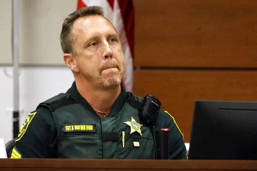 Broward Sheriff's Office Sgt. Richard Van Der Eems describes the scene he encountered at the school after the mass shooting as he testifies during the penalty phase trial of Marjory Stoneman Douglas High School shooter Nikolas Cruz, Friday, July 22, 2022, at the Broward County Courthouse in Fort Lauderdale, Fla. (Mike Stocker/South Florida Sun-Sentinel via AP, Pool, File)