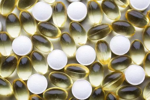 Vitamin D tablets and pills are displayed, Nov. 9, 2016, in New York. More research suggests it’s time to abandon the craze over vitamin D. Taking high doses of “the sunshine vitamin” doesn't reduce the risk of broken bones in generally healthy older Americans, Harvard researchers reported Wednesday, July 27, 2022. (AP Photo/Mark Lennihan)