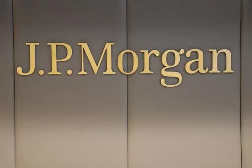 The logo of JPMorgan bank is pictured at the new French headquarters of JP Morgan bank, Tuesday, June 29, 2021, in Paris. JPMorgan Chase is defending itself against a lawsuit by the U.S. Virgin Islands accusing it of empowering Jeffrey Epstein to abuse teenage girls. Lawyers for the giant bank said in court papers Tuesday, May 23, 2023, that it was the islands that enabled the financier to commit his crimes. (AP Photo/Michel Euler, Pool, File)