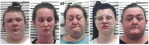 This combo of booking images provided by the Monroe County, Miss., Sheriff’s Office shows from left, Jennifer Newman, Misty Shyenne Mills, Oci-Anna Kilburn, Sierra McCandless and Traci Diane Hutson. Authorities said Friday, Oct. 21, 2022, that the five people linked to viral video footage of workers using a scary mask to frighten children at a Mississippi daycare are now facing charges. Monroe County Sheriff Kevin Crook said four of the women, Newman, Mills, Kilburn, and McCandless each face t
