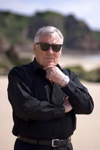 Undated handout photo issued by HarperCollins Publishers of best-selling novelist Henry Patterson, who wrote 85 books, including The Eagle Has Landed, using the pseudonym Jack Higgins, has died aged 92. (HarperCollins Publisher/PA via AP)