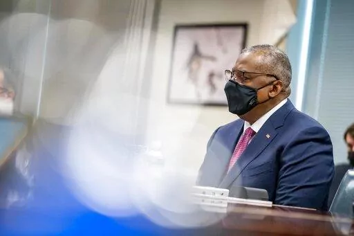 Secretary of Defense Lloyd Austin speaks during a meeting with Emir of Qatar Sheikh Tamim bin Hamad Al Thani at the Pentagon in Washington, Monday, Jan. 31, 2022. (AP Photo/Andrew Harnik, Pool)