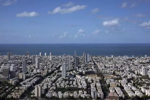 A general view shows the center of Tel Aviv, Israel, Thursday, Dec. 2, 2021. Prime Minister Benjamin Netanyahu has vowed to shut down Al Jazeera’s operations in Israel, calling it a “terror channel” that spreads incitement, after parliament passed a law clearing the way for the closure. (AP Photo/Oded Balilty, File)