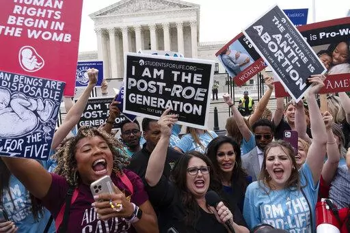 Demonstrators gather outside the Supreme Court in Washington, Friday, June 24, 2022. The Supreme Court has ended constitutional protections for abortion that had been in place nearly 50 years, a decision by its conservative majority to overturn the court's landmark abortion cases. (AP Photo/Jose Luis Magana)