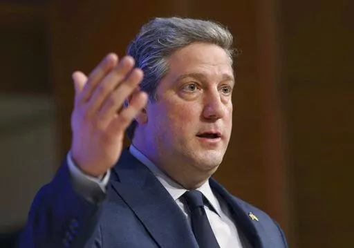FILE—In this file photo from March 28, 2022, U.S. Senate Democratic candidate Rep. Tim Ryan, D-Ohio, in Ohio's U.S. Senate Democratic Primary talks to reporters after after a debate, in Wilberforce, Ohio. Democratic U.S. Rep. Tim Ryan and Trump-endorsed Republican and "Hillbilly Elegy" author JD Vance are scheduled to participate Monday, Oct. 10, 2022 in Cleveland for the first of two scheduled debates in their race to succeed retiring Republican Sen. Rob Portman in Ohio. (Joshua A. Bickel/The