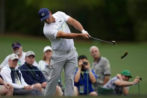 Bryson DeChambeau hits on the 12th tee during a practice round for the Masters golf tournament on Wednesday, April 6, 2022, in Augusta, Ga. (AP Photo/Matt Slocum)