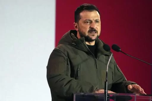 Ukrainian President Volodymyr Zelenskyy holds a speech during his visit to Warsaw, Poland, April 5, 2023. Ukraine is promising to investigate a gruesome video circulating on social media that purportedly shows the beheading of a Ukrainian soldier. Zelenksyy on Wednesday, April 12 blamed Russia and said the violence would not be forgotten, while the Kremlin called the footage “horrible” but said it needed to be verified.(AP Photo/Czarek Sokolowski, file)