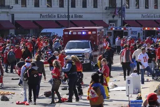 Police clear the area following a shooting at the Kansas City Chiefs NFL football Super Bowl celebration in Kansas City, Mo., Wednesday, Feb. 14, 2024. Three men from Kansas City, Mo.,, face firearms charges, including gun trafficking, after an investigation into the mass shooting during the Kansas City Chiefs’ Super Bowl parade and rally, federal prosecutors said Wednesday, March 13, 2024. (AP Photo/Reed Hoffmann, File)