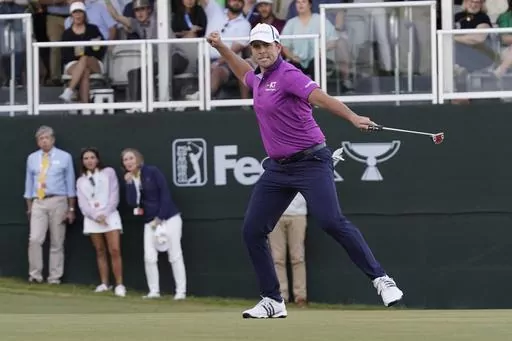 Luke List skips as he sinks a 43-foot putt for birdie on No. 18 to win the Sanderson Farms Championship golf tournament Sunday, Oct. 8, 2023, in Jackson, Miss. (AP Photo/Rogelio V. Solis)