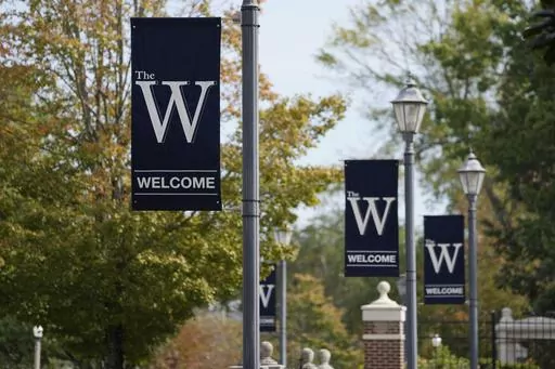 Mississippi University for Women banners decorate the Columbus, Miss., campus, Oct. 23, 2023. The university announced a proposal Monday, Jan. 8, 2024, to change its name to Mississippi Brightwell University, with officials saying the new name is supposed to reflect the diversity of the public institution that has been enrolling men since 1982. (AP Photo/Rogelio V. Solis)