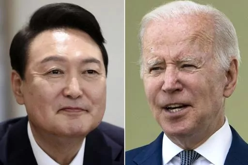 This photo combination of two file photos shows U.S. President Joe Biden, right, in Washington, on May 15, 2022, and South Korean President Yoon Suk Yeol in Seoul, on May 10, 2022. Leaked U.S. intelligence documents suggesting that Washington spied on South Korea have put the country’s president in a delicate situation ahead of a state visit to the U.S. (AP Photo/File)