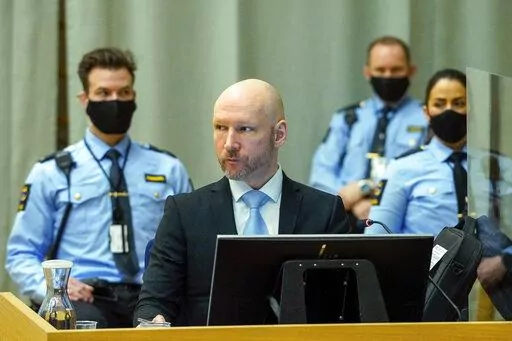 Convicted mass murderer Anders Behring Breivik sits in the makeshift courtroom in Skien prison on the second day of his hearing where he is requesting release on parole, in Skien, Norway, Jan. 19, 2022. A decade after the 2011 bombing and shooting spree that left 77 dead, Breivik is seeking early release from a 21-year sentence — the maximum term in Norway. (Ole Berg-Rusten/NTB scanpix via AP, File)