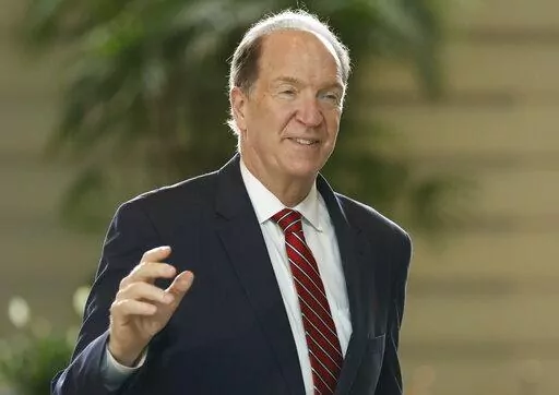 David Malpass, president of the World Bank Group, arrives for a meeting with Japan's Prime Minister Fumio Kishida at Kishida's official residence in Tokyo, Japan, Sept. 13, 2022. Malpass said Friday, Sept. 23, 2022, that he will not resign after coming under criticism for his remarks earlier this week regarding climate change. (Issei Kato/Pool Photo via AP, File)